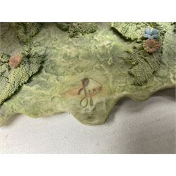 Two Capodimonte figures, comprising The Watchmaker by Curiase and Tramp Seated on a Bench, created by D.Bonalberti, tallest example H24cm