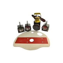 Three British Railway Bardic lamps, an enamel shunting signal disc and a yellow and black signal lamp