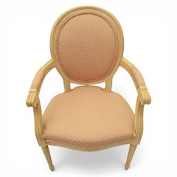 Set of two French design fauteuil armchairs upholstered in pink fabric, one with oval medallion back and padded arms on fluted tapering supports (H 97cm, W 58cm, D 54cm), the other with rectangular padded back, scroll arms and fluted tapering supports (H 99cm, W 60cm, D 60cm)