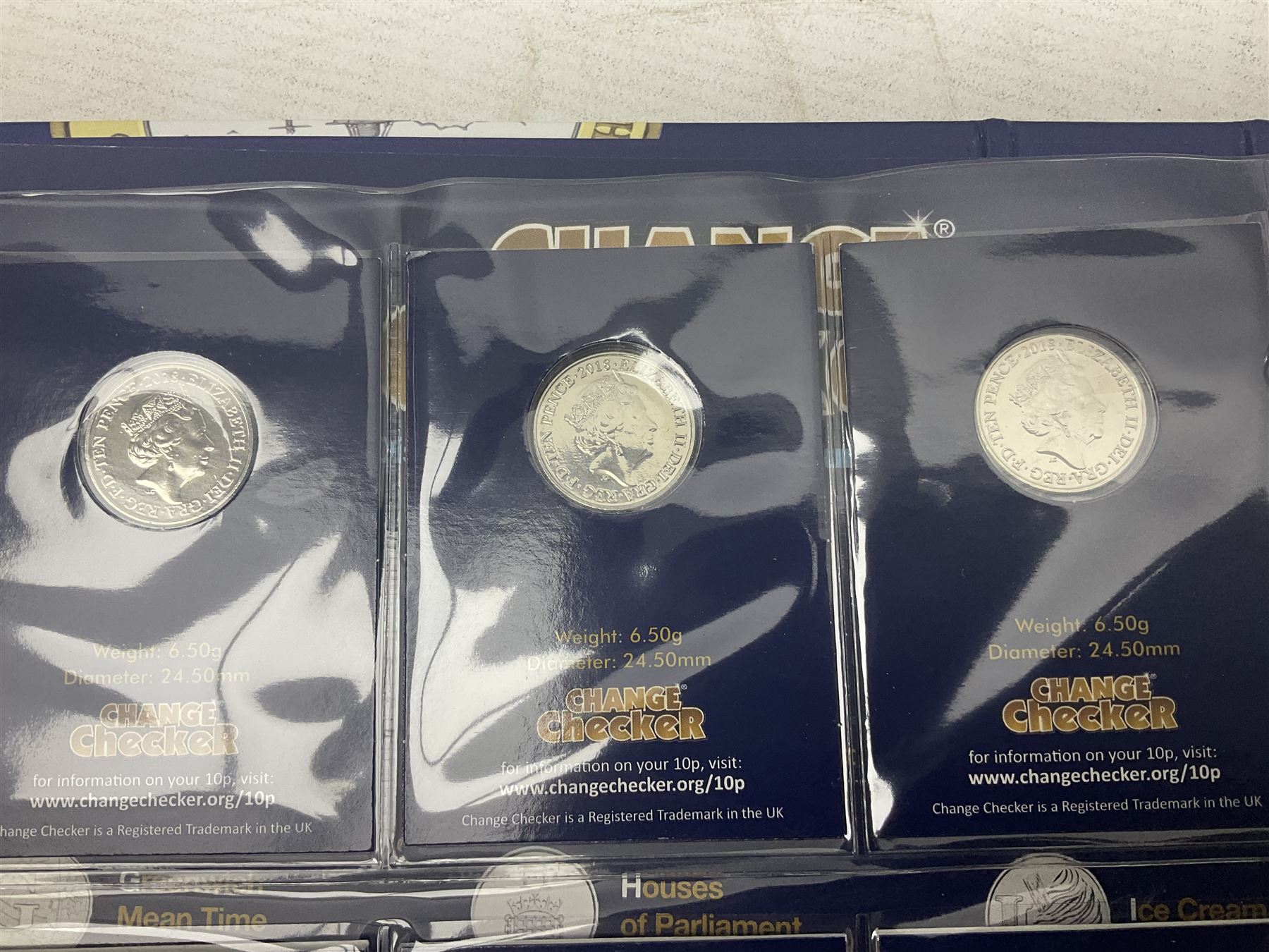 Queen Elizabeth II United Kingdom 2018 A-Z ten pence coin collection, including completer medallion, housed in a 'Change Checker' ring binder folder

