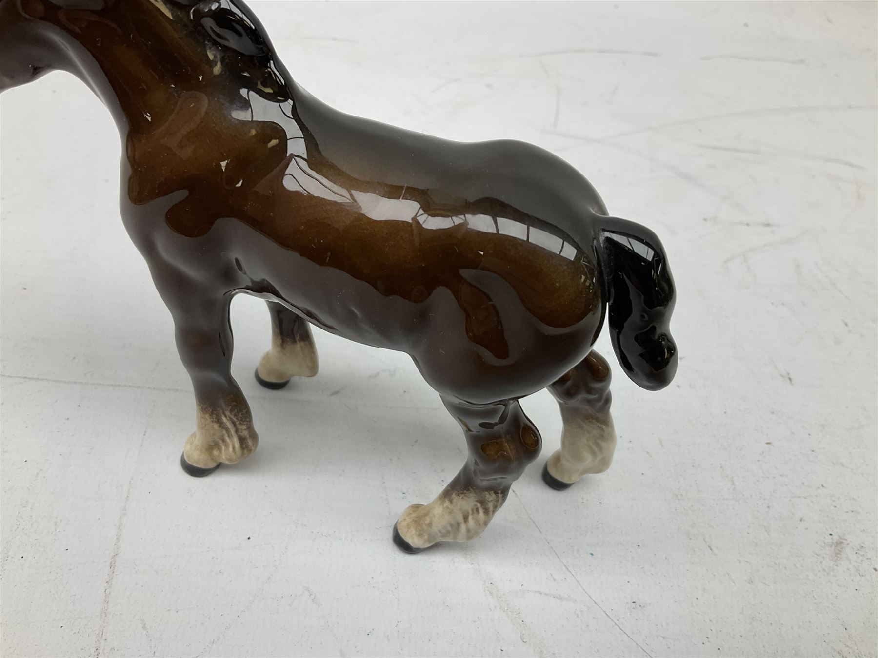 Seven Beswick figures of horses, including Connemara pony in grey no.1641, Arab in bay no.1265, large foal in grey no.947 etc, together with a Goebel figure of a horse (8)