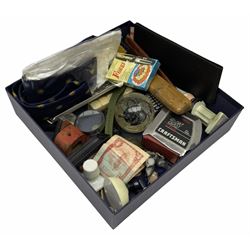 Glass paperweight, tape measure, magnifying glass, tie and other miscellaneous items, in one box
