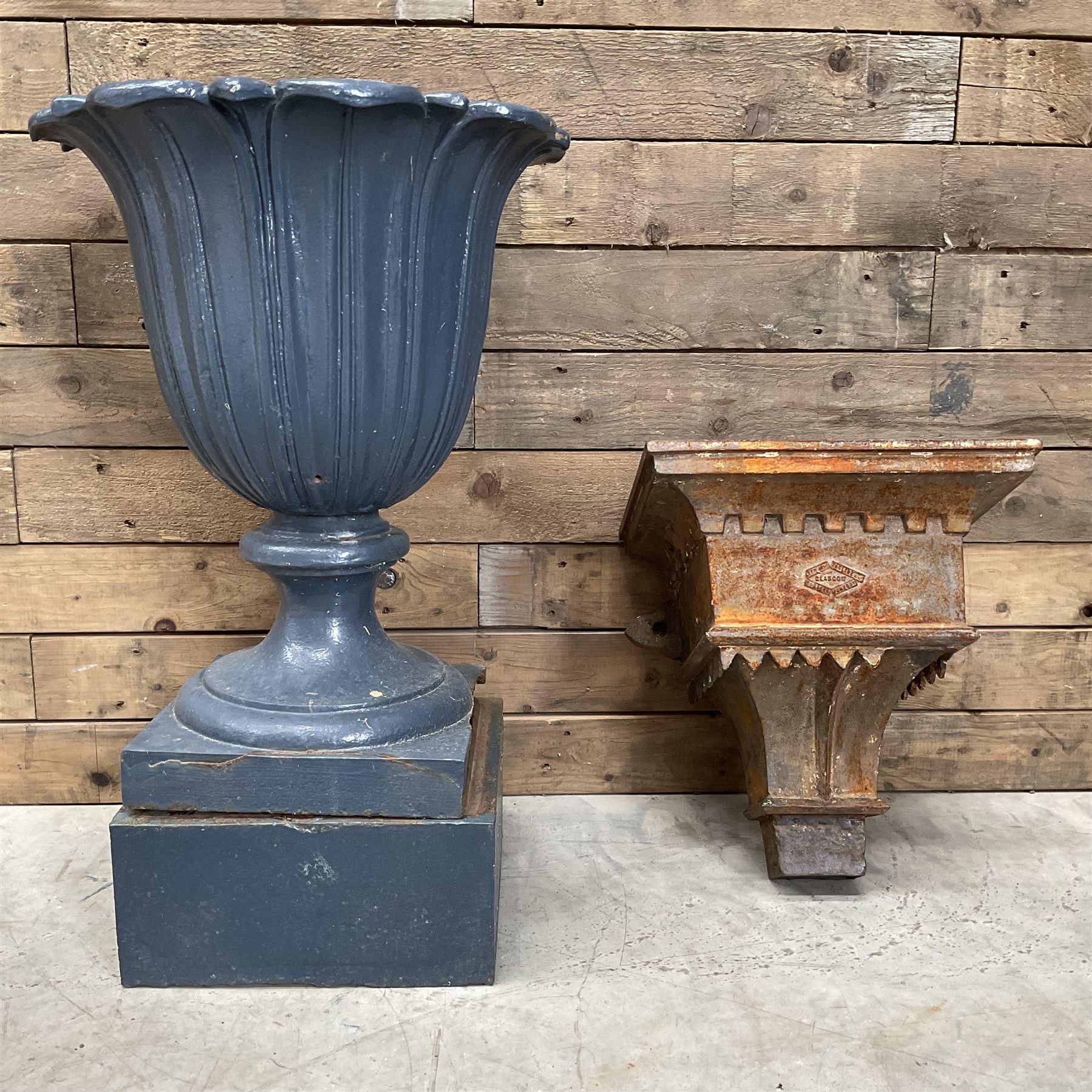 19th century blue painted cast iron lotus garden urn with plinth, and a cast iron rain hopper