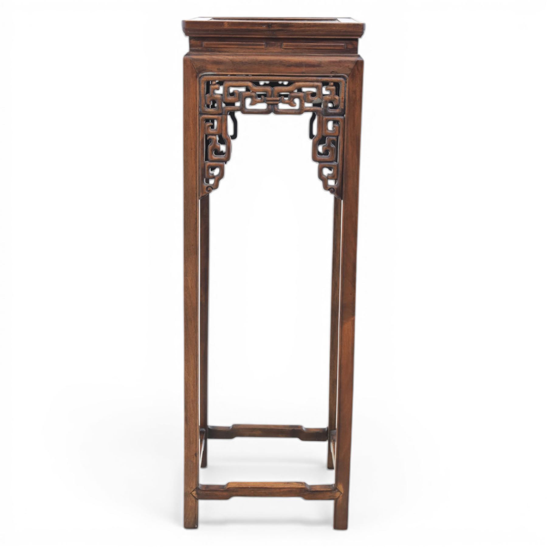 Chinese style hardwood open latticework plantstand, square top ove latticework spandrels raised on square supports united by stretchers
