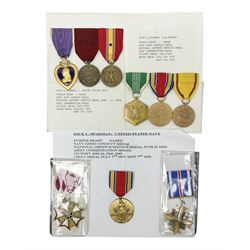 Nine American medals comprising Legion of Merit, Distinguished Flying Cross, Purple Heart named to Dick L. Sparman, Navy Good Conduct Medal, National Defence Service Medal, Army Commendation Medal, two WWII Victory Medals and China Medal; all with ribbons (9)