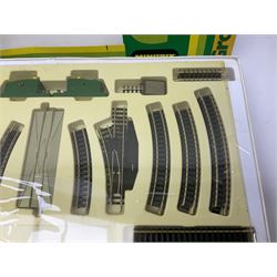 Trix Minitrix 'N' gauge - No.14992 Track Set; boxed; five small packs of track nos.14905, 14954, 14955 and two 14964; two transformers Steger44-005.0; two Steger power controllers 44-004.9; all unboxed; No.66623 Locomotive Wheel Cleaning Brush; boxed; and quantity of paperwork.