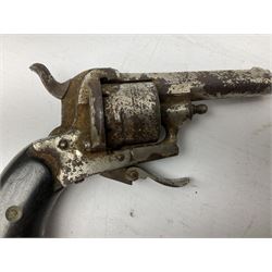 19th century 7mm six-shot pin-fire revolver, with folding trigger, two-piece ebonised grip and ejector rod in butt L17cm