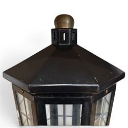 Georgian design black-painted metal octagonal hanging lantern, with brass ball finial above a hipped canopy, astragal glazed lattice panels and pendant ball terminal