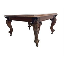 Victorian mahogany extending dining table, moulded rectangular top with rounded corners, telescopic mechanism with leaf and winding handle, on leaf and cartouche carved cabriole supports, brass and ceramic castors