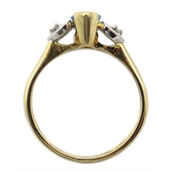  Gold marquise shaped topaz and heart design ring set with two diamonds, stamped 9   