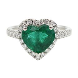Platinum heart shaped Zambian emerald and diamond cluster ring, with diamond set shoulders, hallmarked, emerald approx 1.85 carat, total diamond weight approx 0.35 carat 