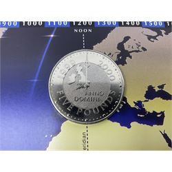 Ten Queen Elizabeth II United Kingdom five pound coins, including 1997, 2001 etc, all in card folders