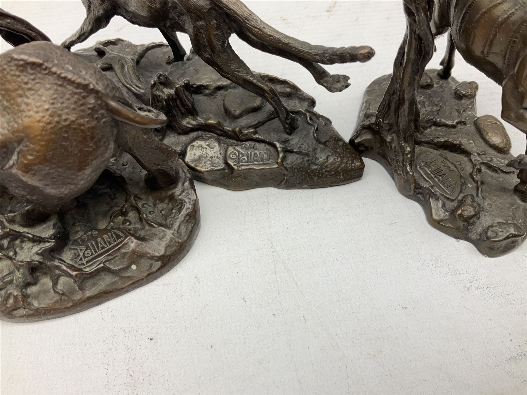 Six Franklin Mint bronze models of African animals, comprising Lion, Black Rhinoceros, Greater Kudu, Cheetah, Giraffe and African Elephant, tallest example H14cm