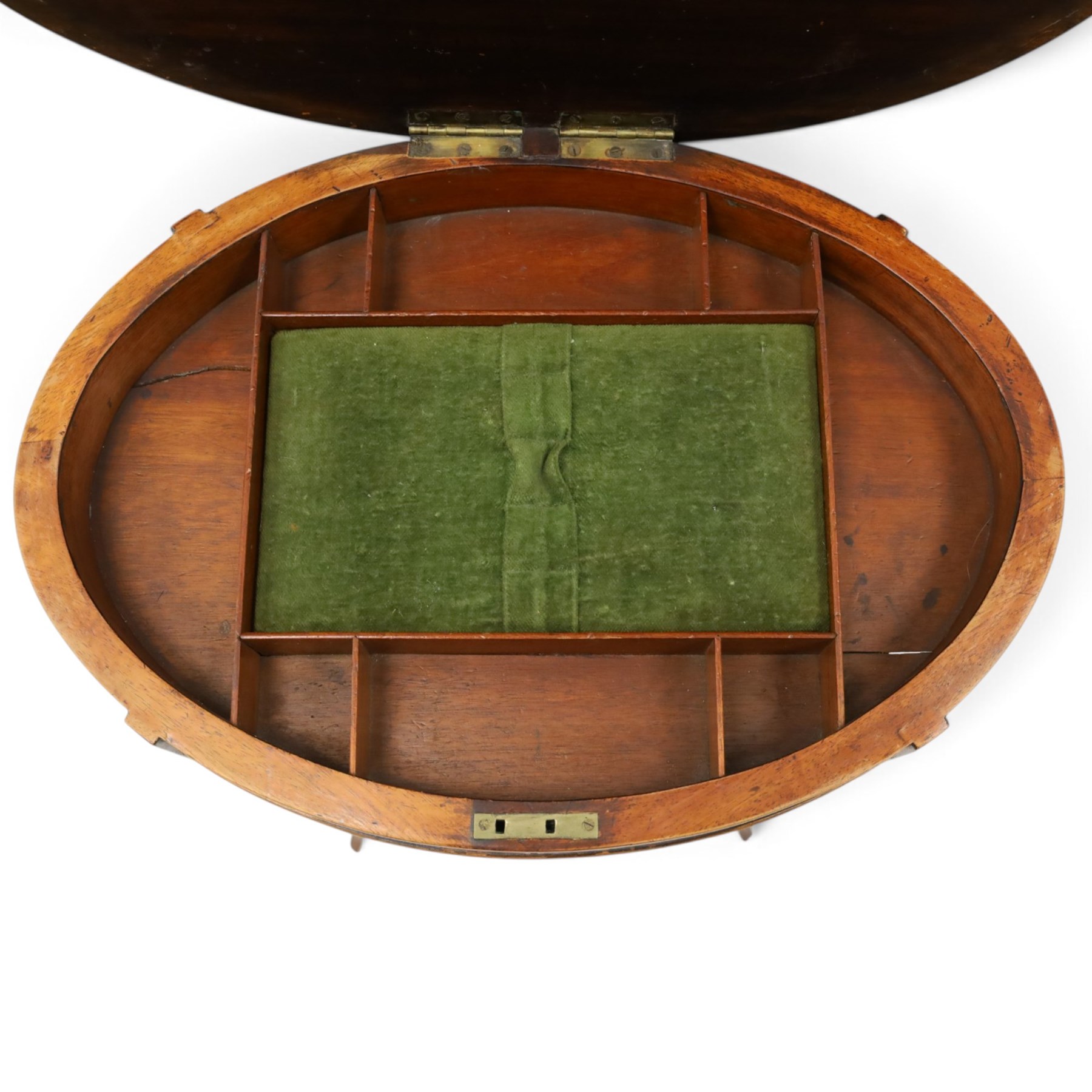 Edwardian inlaid satinwood oval sewing or work table, crossbanded and ebony-strung hinged top enclosing fitted compartment and olive-green upholstered well, raised on square tapering splayed supports united by under-tier 