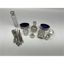 Pair of Georgian silver navette shaped salts with blue glass liners, hallmarks worn and indistinct, silver matchbox cover embossed birds, mask and scrollwork, hallmarked W J Myatt & Co, Birmingham 1902, Pepper shaker, G. Bryan & Co., Birmingham 1939, together with small group of silver mounted glass jars and silver handled button hooks and accessories, various hallmarks