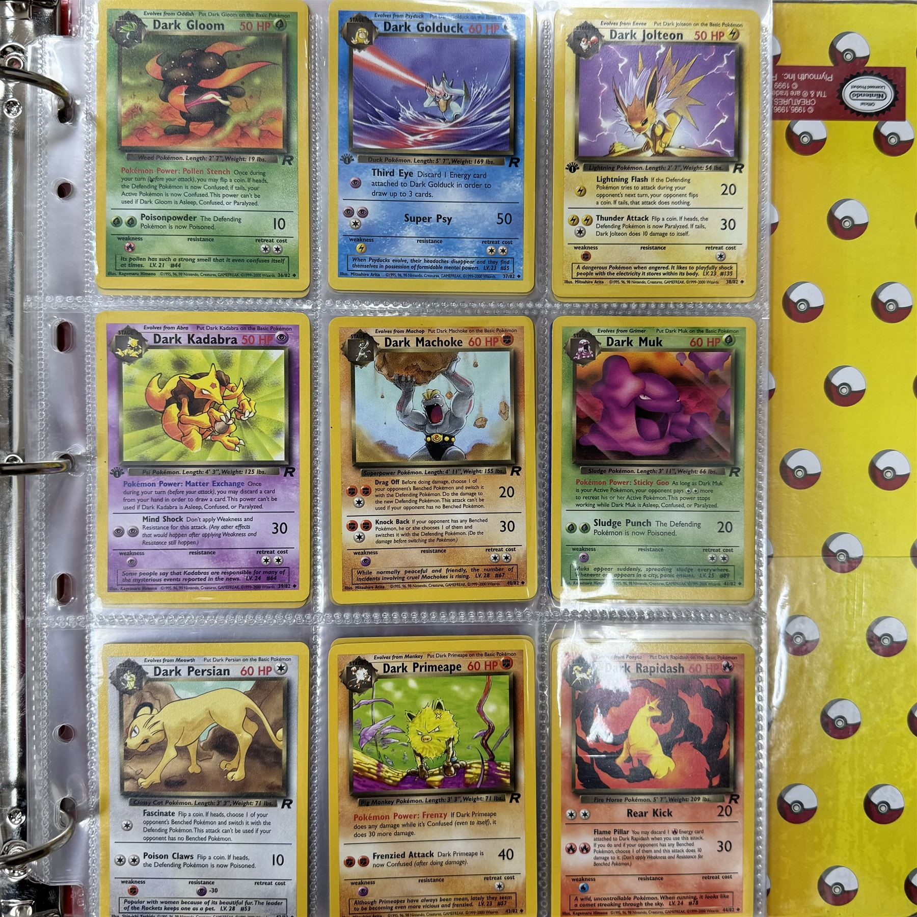 Collection of approximately 400 Pokemon trading cards, mostly 1999 Wizards Pokemon cards to include 1st Edition Dark Gyarados holo 8/82, Dark Charizard 4/82 holo and 21/82 non holo, Dark Blastoise 3/82 holo and 20/82 non holo, Dark Raichu holo 83/82, Dark Dragonite 22/82, eleven first edition cards, Japanese cards, Trainer cards, etc, together with an album of Pokemon the First Movie cards, a voice actor signed copy of Pokemon: The First Movie Animation Comics Mewtwo Strikes Back #1, 5305/8000 with certificate of authenticity with comics 2, 3 and 4 