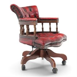 Georgian design captains swivel desk chair, rolled cresting rail over open spindle back on...