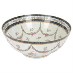 19th century Samson style punch bowl, decorated in the manner of a Chinese export example, with floral sprays and gilt highlighted cobalt blue double border to rim, with armorial crest to exterior, red mark beneath, D35cm
