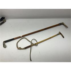 Collection of hunting crops and riding whips, including horn handle examples with silver cuffs