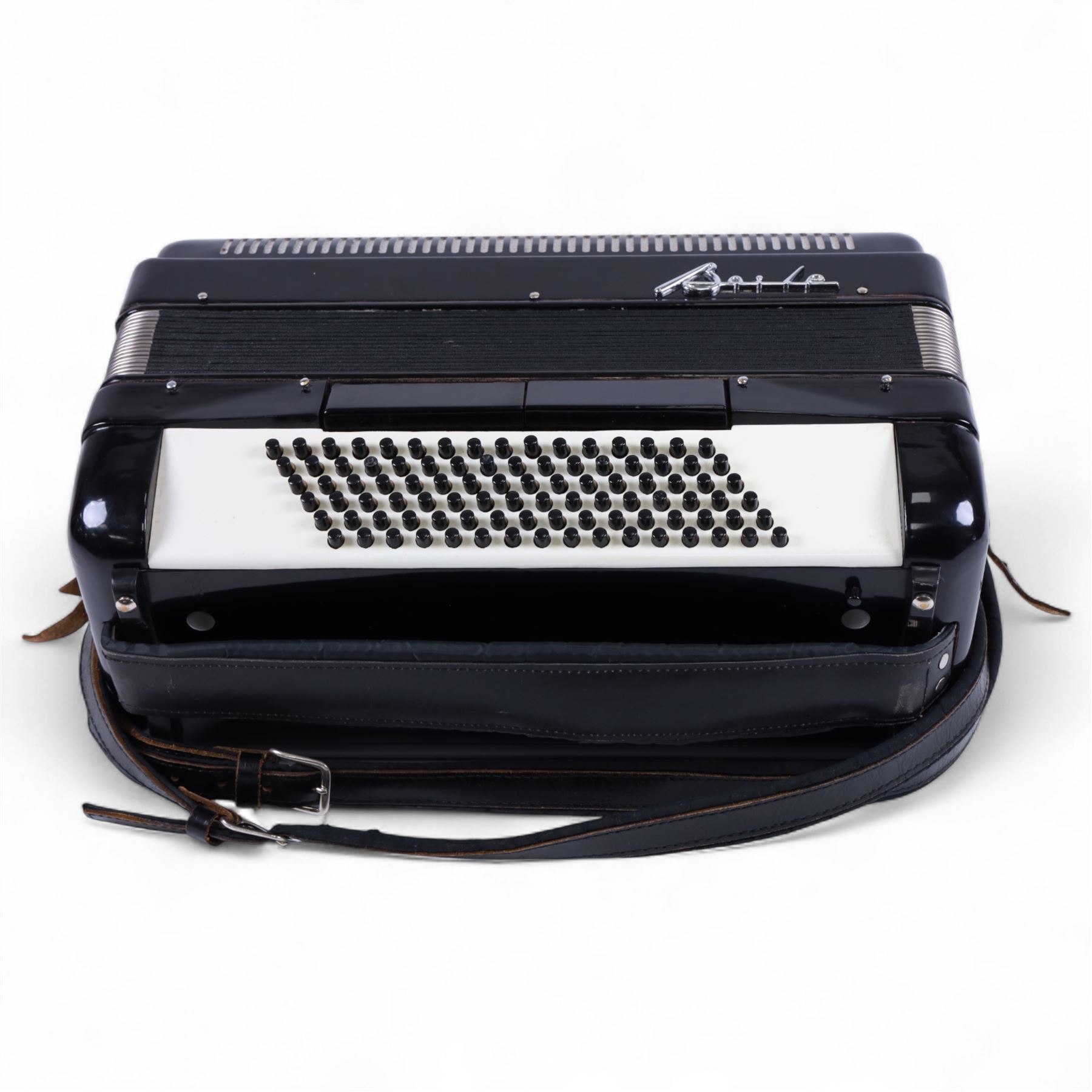 Bai-Le-20th century Chinese Piano Accordion, three octave keyboard with 96 treble buttons and 7 base keys, 16-fold bellows with shoulder straps and hard carrying case.
