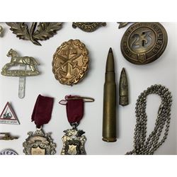 Two Edwardian hallmarked silver presentation fobs for military bugling competitions; and quantity of cap/glengarry and other badges, sweetheart brooches etc