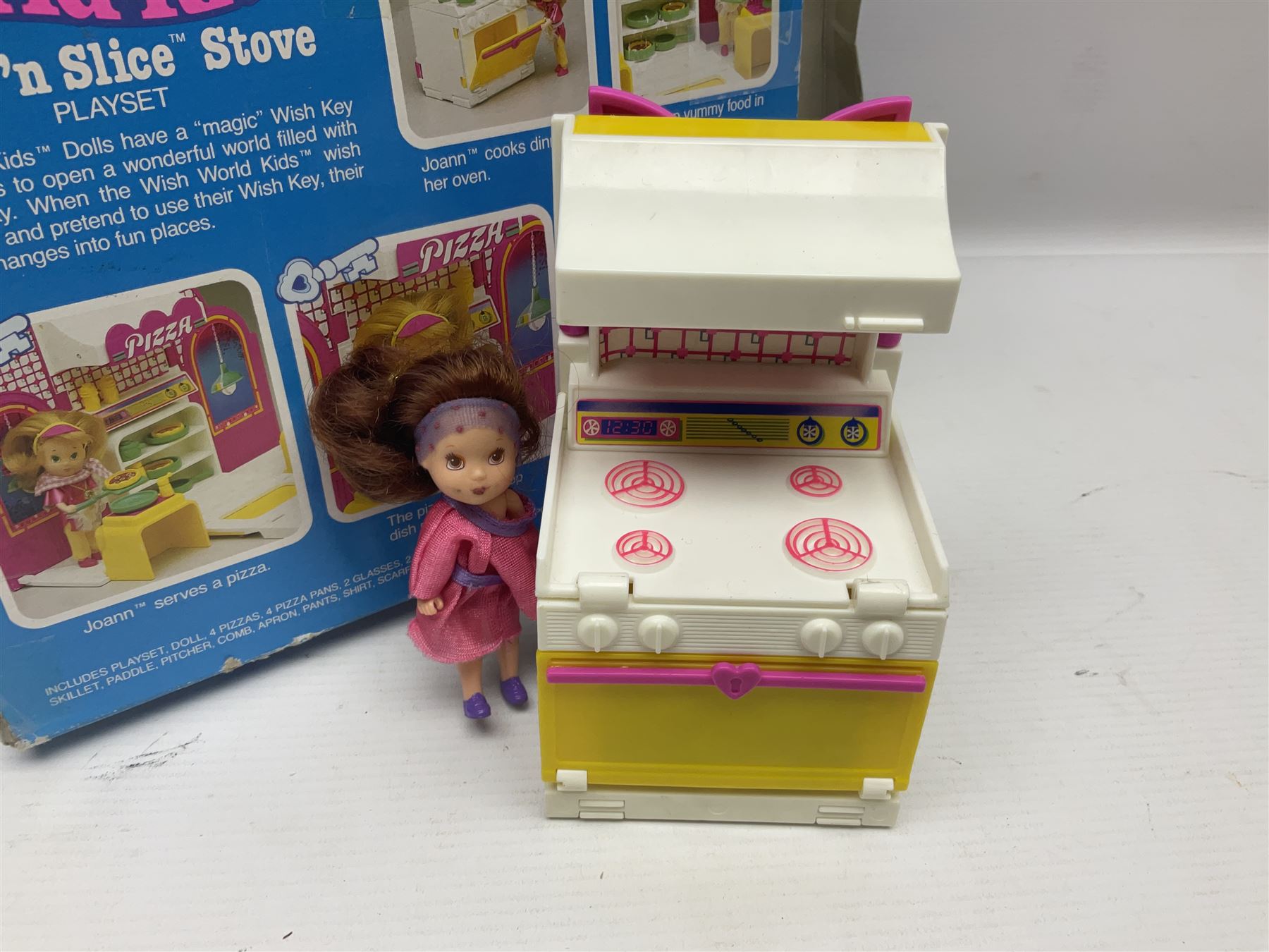 Wish World Kids - Eleven play sets comprising Treats ‘n Sweets Refrigerator, Grin ‘n Win TV, Sponge ‘n Plunge Bathtub, Socks ‘n Locks Dresser, Spice ‘n Slice Stove, Sleep ‘n Leap Bed, File ‘n Smile Desk, Blaze ‘n Braise Fireplace, Hear ‘n Cheer playset in Sponge ‘n Plunge box, two Read ‘n Speed Chair playsets in one box