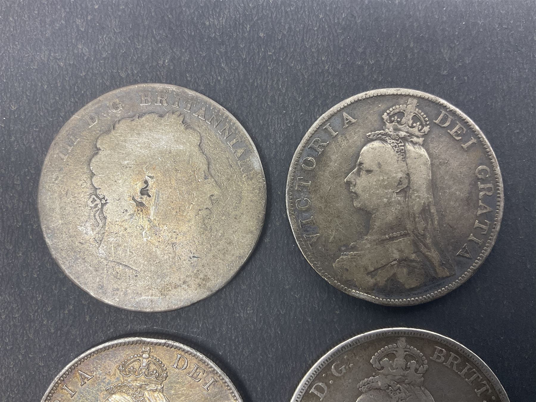 Queen Victoria 1889 silver crown coin, two double florins dated 1887, 1890 and a George III crown with illegible date (4)