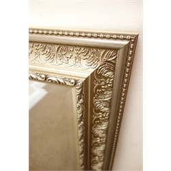 Ornate silver framed bevel edge wall mirror, W67cm, H92cm  