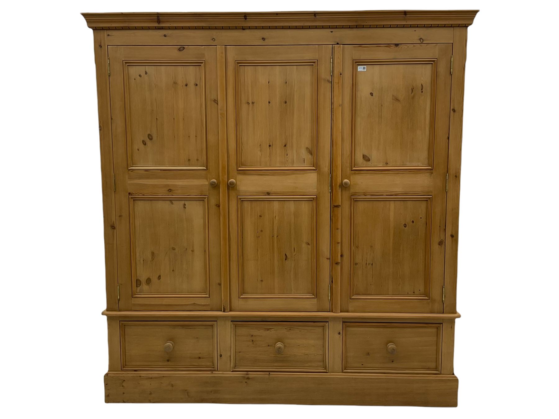 Solid pine triple wardrobe with three drawers
