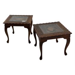 Pair of Pakistan carved hardwood brass inlaid lamp tables, square form, cabriole legs, inset glass tops