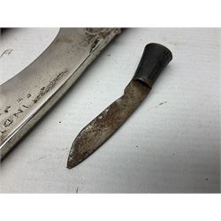 Indian kukri with 29cm curving steel blade and nickel mounted horn grip; in leather covered scabbard with one skinning knife L42cm overall; Hitler Youth knife with scabbard in relic condition; and three African graduated knives each with crudely carved wooden grips and painted leather covered scabbards (5)