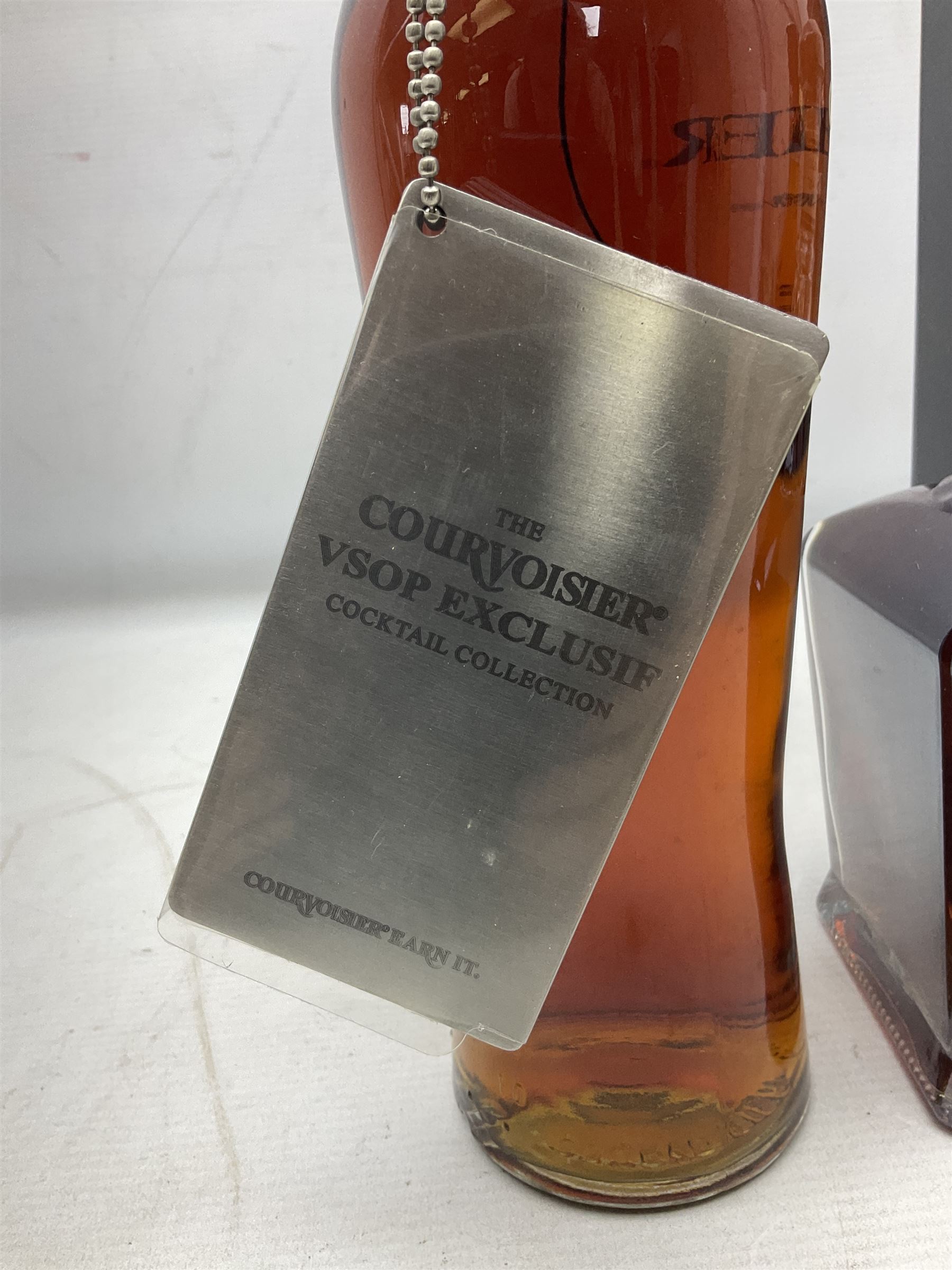 Jack Daniels, single barrel Tennessee whisky, 700ml, 45% vol, Jack Daniels, Tennessee whiskey master distiller series No.4, 700ml, 43% vol, and Courvoisier VSOP cognac, 70cl, 40% vol (3)