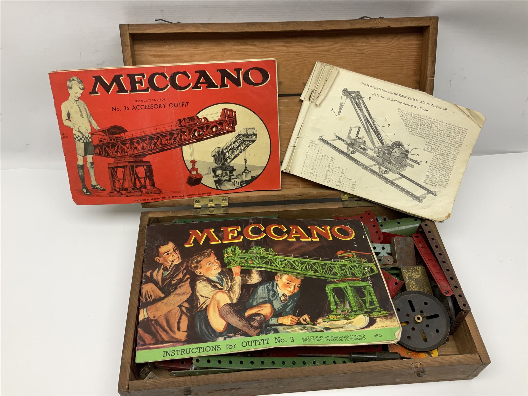Meccano - quantity of playworn sections in red and green, in scratch-built pitch pine box with 3, 3A and 4A instruction booklets, box L43cm