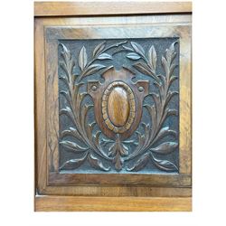 Late Victorian walnut triple combination wardrobe, projecting moulded and dentil cornice, central shaped bevelled mirror glazed door, cartouche and curled leaf carved panels over figured walnut veneered panels, fitted with drawer to base, on bracket feet