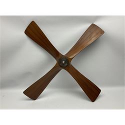 British World War II era laminated wooden four-bladed generator propeller, late 1930s-40s, used to power a drogue winch used by a target tug aircraft; marked with DRG drawing number T29505-2-4 N760 on the hub and impressed circle mark 'P.M.P.W. 1'; light weight four plank mahogany laminate with 9.5cm diameter metal plates mounted to front and rear faces of hub for 15mm shaft; one plate marked T29504-2/198 D91cm; together with a modern reproduction brass edged mahogany two-blade propellor L