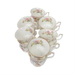 Royal Albert Moss Rose tea and dinner wares, including teapot, coffee pot, fourteen cups and saucers, milk jug, open sucrier etc  