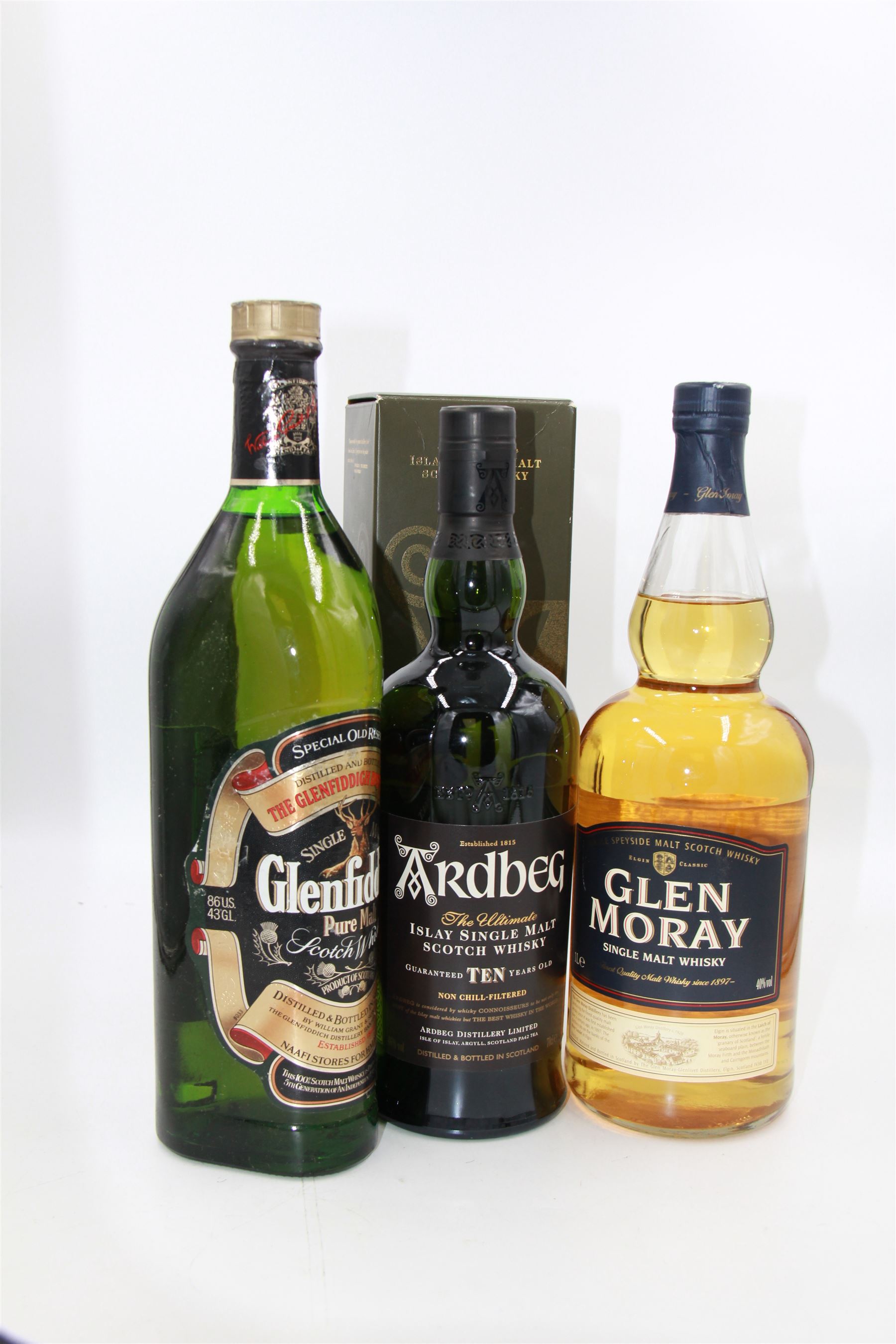 Ardbeg, 10 year old single malt Scotch whisky, 70cl 46% vol in presentation box, Glenfiddich, special old reserve pure malt Scotch whisky, 1 litre 40% G.L and Glen Moray, single malt whisky, 1l 40% vol (3)