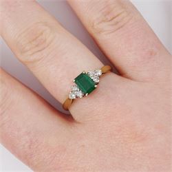 9ct gold emerald and diamond ring, single octagonal cut emerald of approx 0.45 carat, set between brilliant cut diamond trefoil shoulders