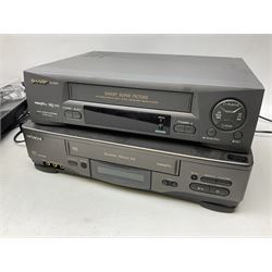 Two VHS video cassette recorders comprising Sharp VC-M312 and Hitachi F645E, together with Philips Digital Terrestrial Receiver, Toshiba VHS 4Head and a record player