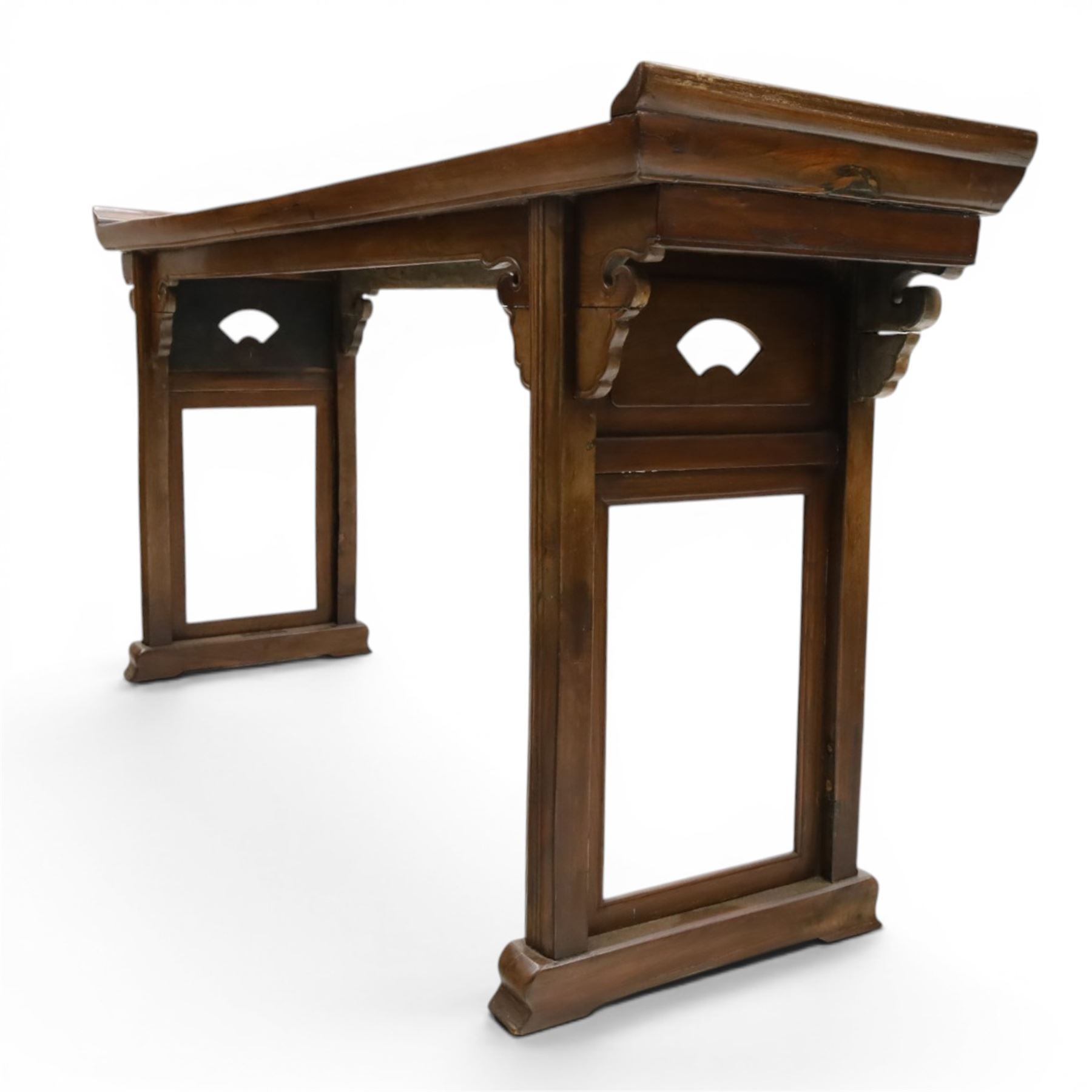 Chinese elm altar table, rectangular plank top with galleried sides, raised on reeded square supports with scrolled spandrels