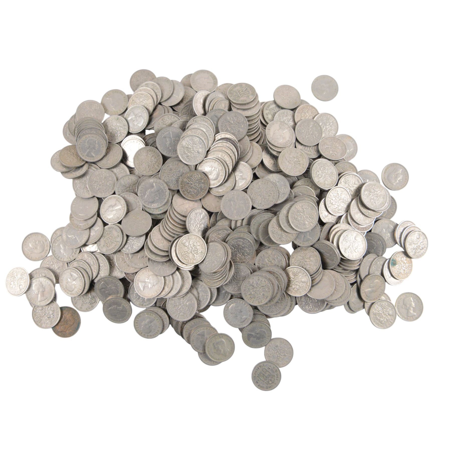 Approximately 166 grams of Great British pre-1947 silver coins, together with approximately 4.8kg of post-1947 sixpences, commemorative crowns, and further coins
