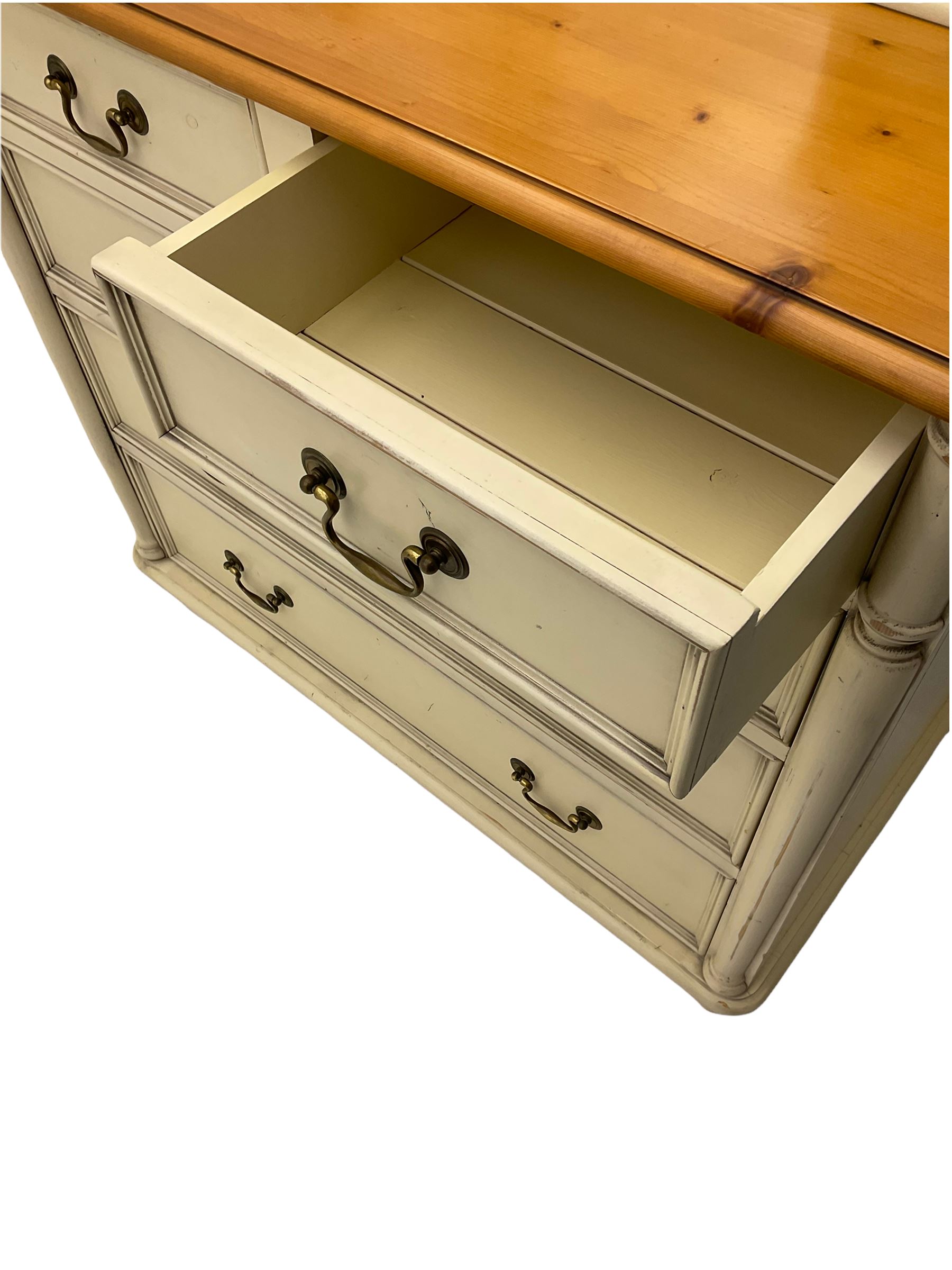 Laura Ashley pine and cream finish vanity chest, fitted with two short and three long drawers, swing mirror back