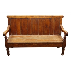  19th century country pine hall bench seat, five panel back with moulded top rail and shaped arms, planked seat on turned tapering supports, squab seat cushion, W158cm, D57cm, H96cm  