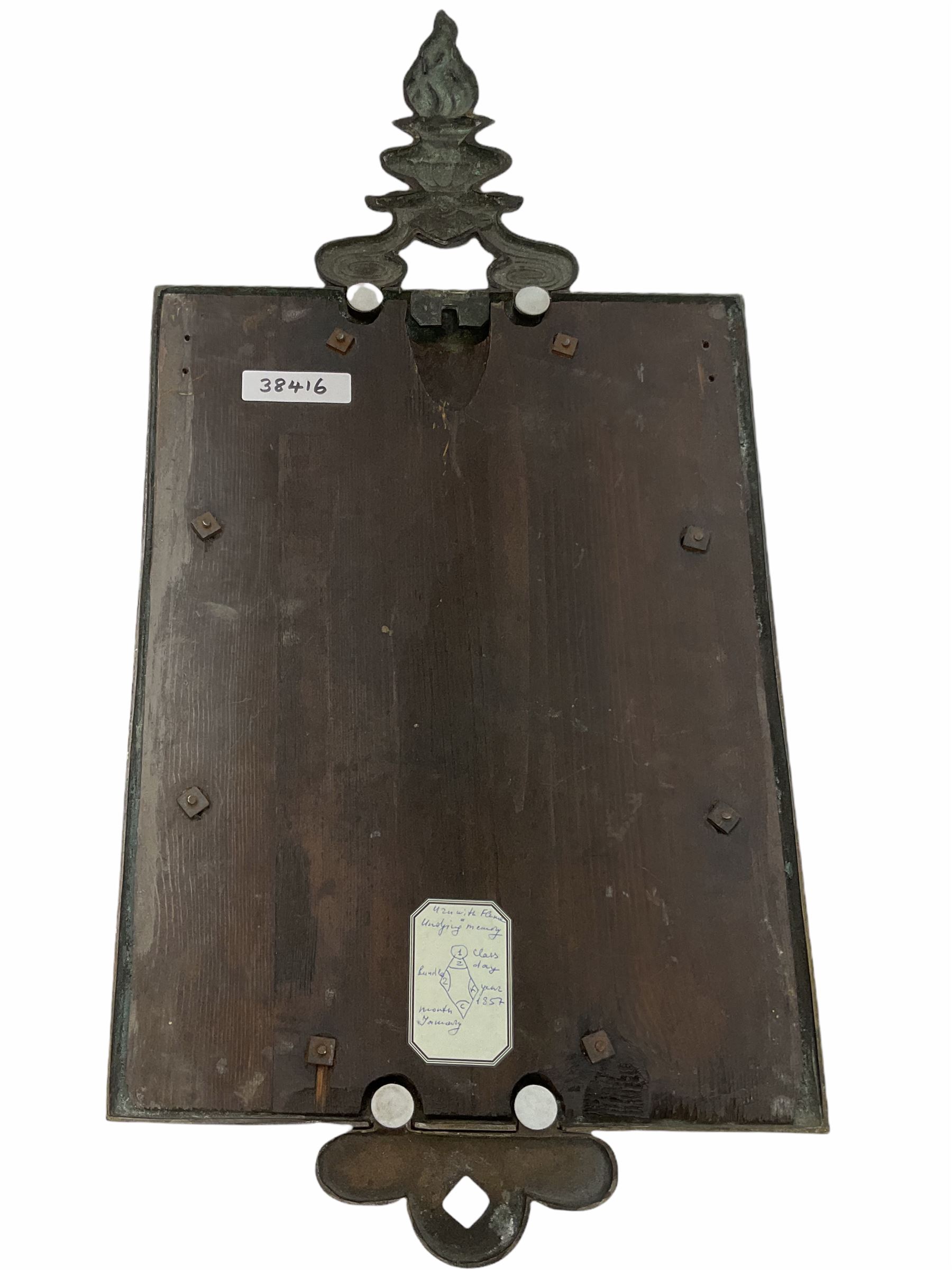 Victorian mirror, the rectangular bevelled glass plate within a bronze frame surmounted by a flaming urn representing undying memory, with Victorian registration lozenge verso, H65cm L29.5cm