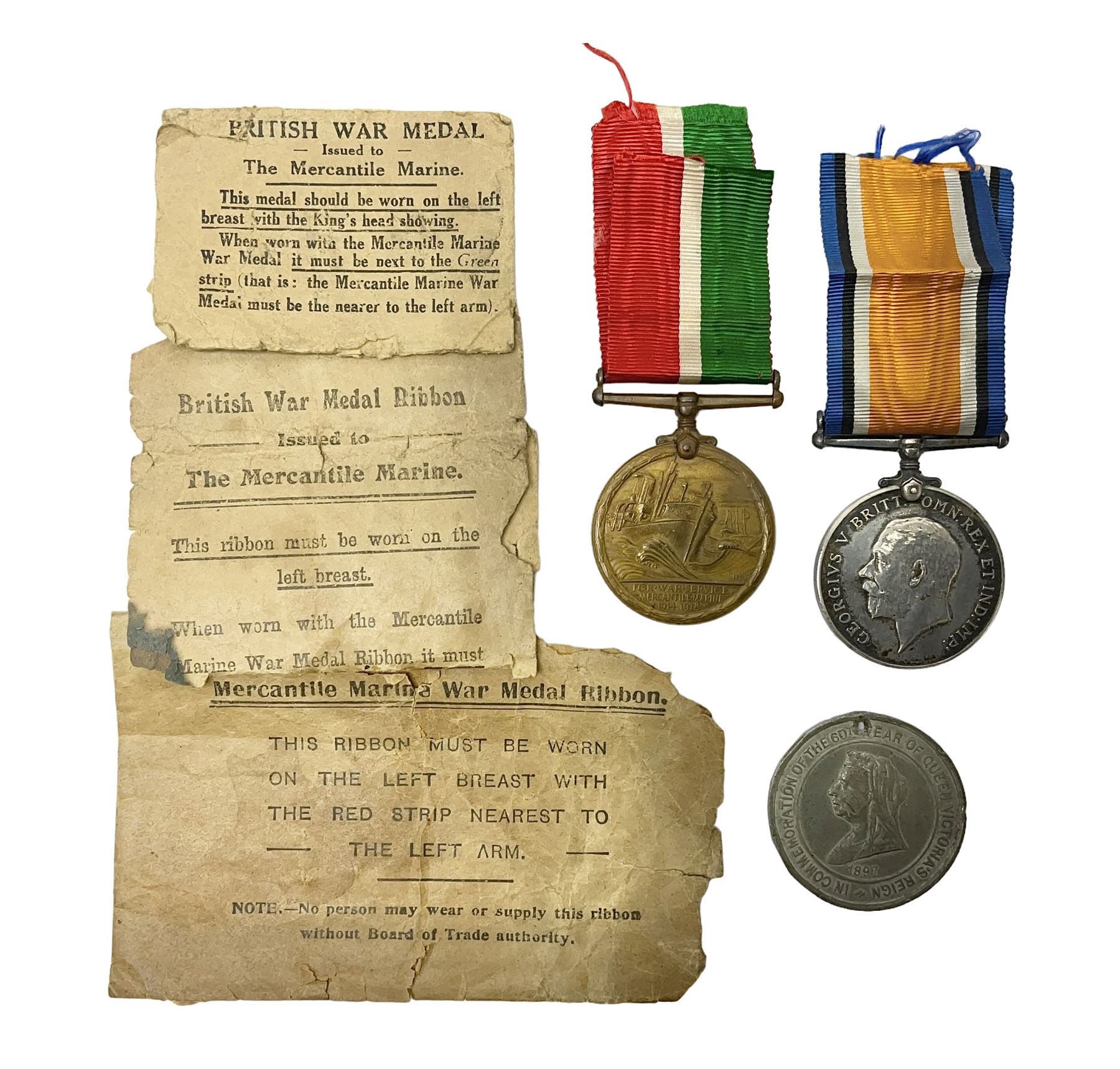 WWI pair of medals comprising Mercantile Marine medal and British War medal, awarded to Dominic L Kelly; both with ribbons and part original packaging and a Victoria Diamond Jubilee medallion.