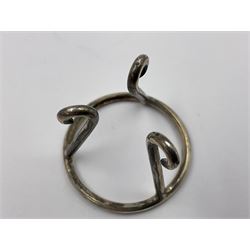 Modern silver limited edition Easter egg, no. 70/500, the gilt openwork body decorated with cascading bluebells and hinged cover with pierced circular panel set with a single faceted purple stone, opening to reveal a gilt interior, upon silver stand with three scrolling pad feet, each hallmarked St James House Company, London 1981, height including stand 8cm