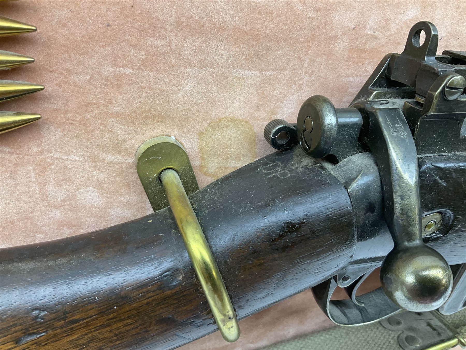 WW2 Lee Enfield No.4 Mk.1 .303 bolt-action rifle with hinged butt compartment, made by SA Ltd., Long Branch, Canada 1942, serial no.5L0646 L113cm; mounted on a framed display board with No.4 Mk.II spike bayonet, No.9 Mk.1 blade bayonet, two inert 5-round clips and brass biographical plaque by Antler Military Originals detailing DA Cert No.C3444 OLD STYLE DEACTIVATION SO FIREARMS CERTIFICATE REQUIRED OR RFD