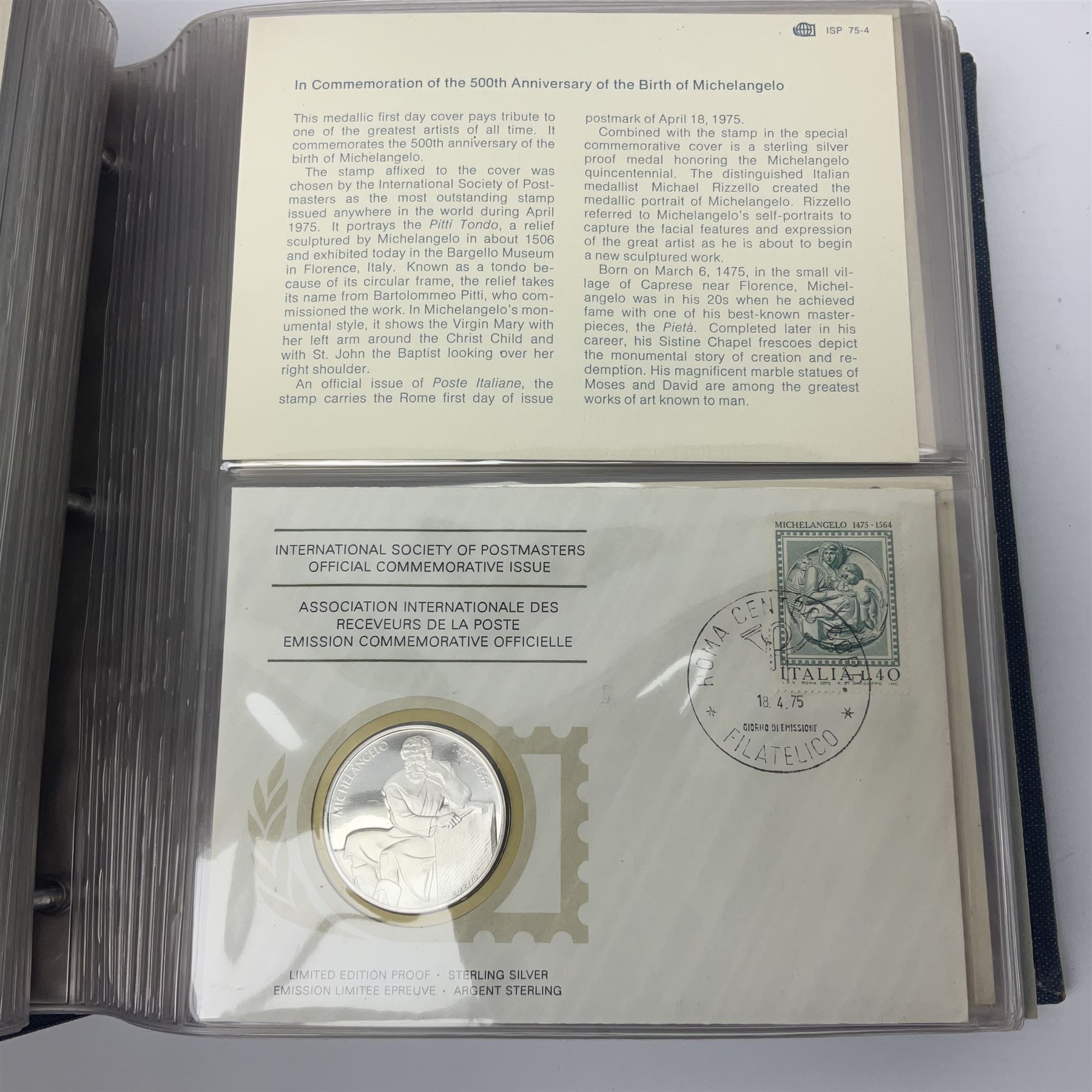 Thirty-one 'International Society of Postmasters Official Commemorative Issues' sterling silver proof medallic covers dating from 1975 to1977, housed in the official folder and a 'Commemorating The Bicentennial Of The United States Of America' sterling silver proof medallic first day cover in blue wallet