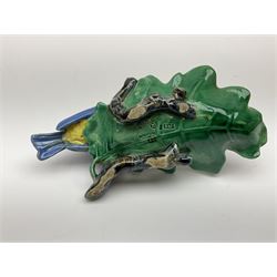 Minton majolica leaf dish, modelled as a Blue Tit perched on a branch with acorns and an oak leaf, date cypher for 1868, impressed marks beneath, L21cm. 