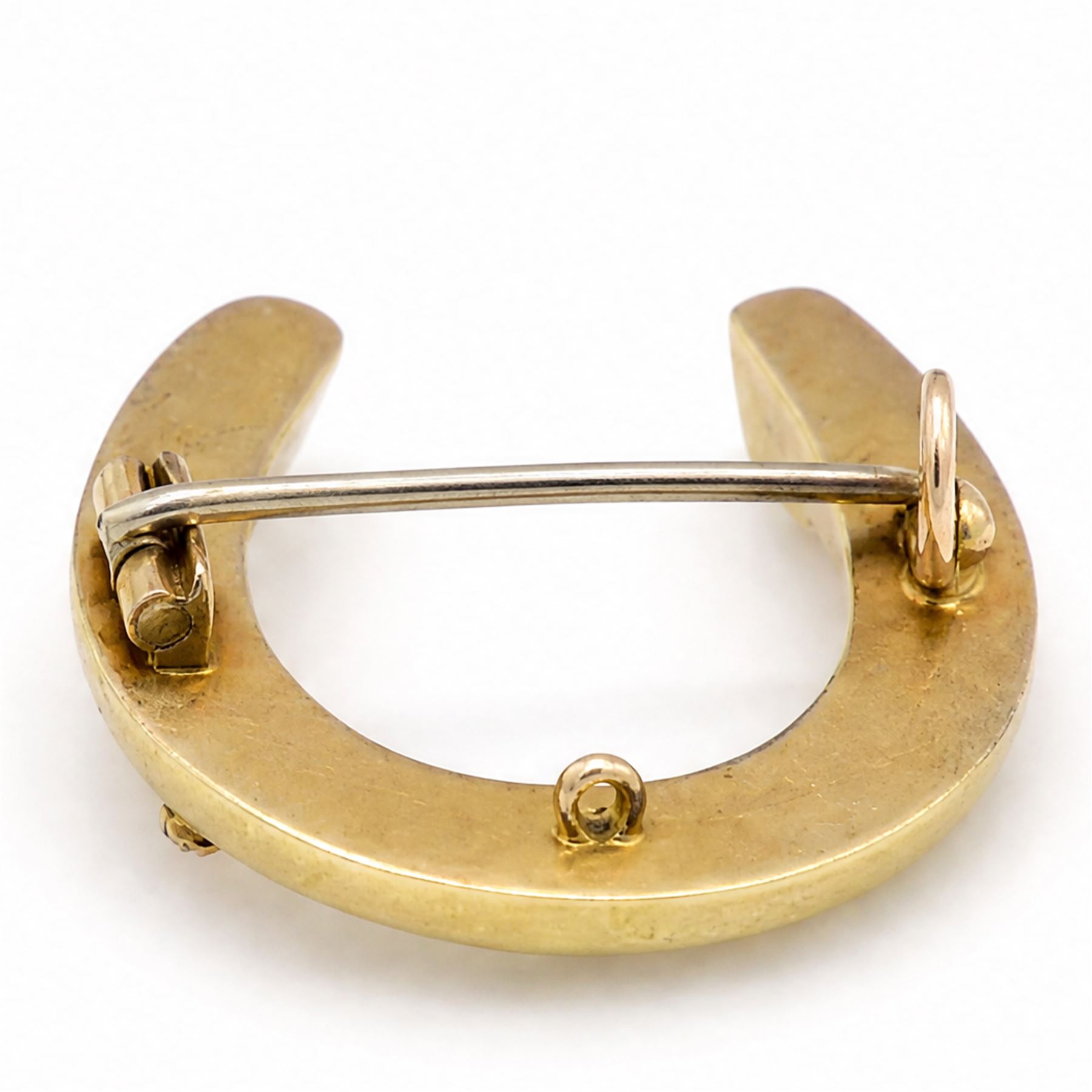 19th / early 20th century diamond horseshoe brooch, set with seven rose cut diamonds